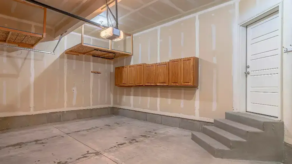 Unfinished basement in a West Islip, NY home prepared for basement finishing and framing.