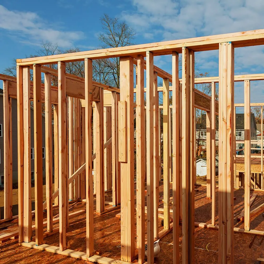 A house is being built with wooden frames.