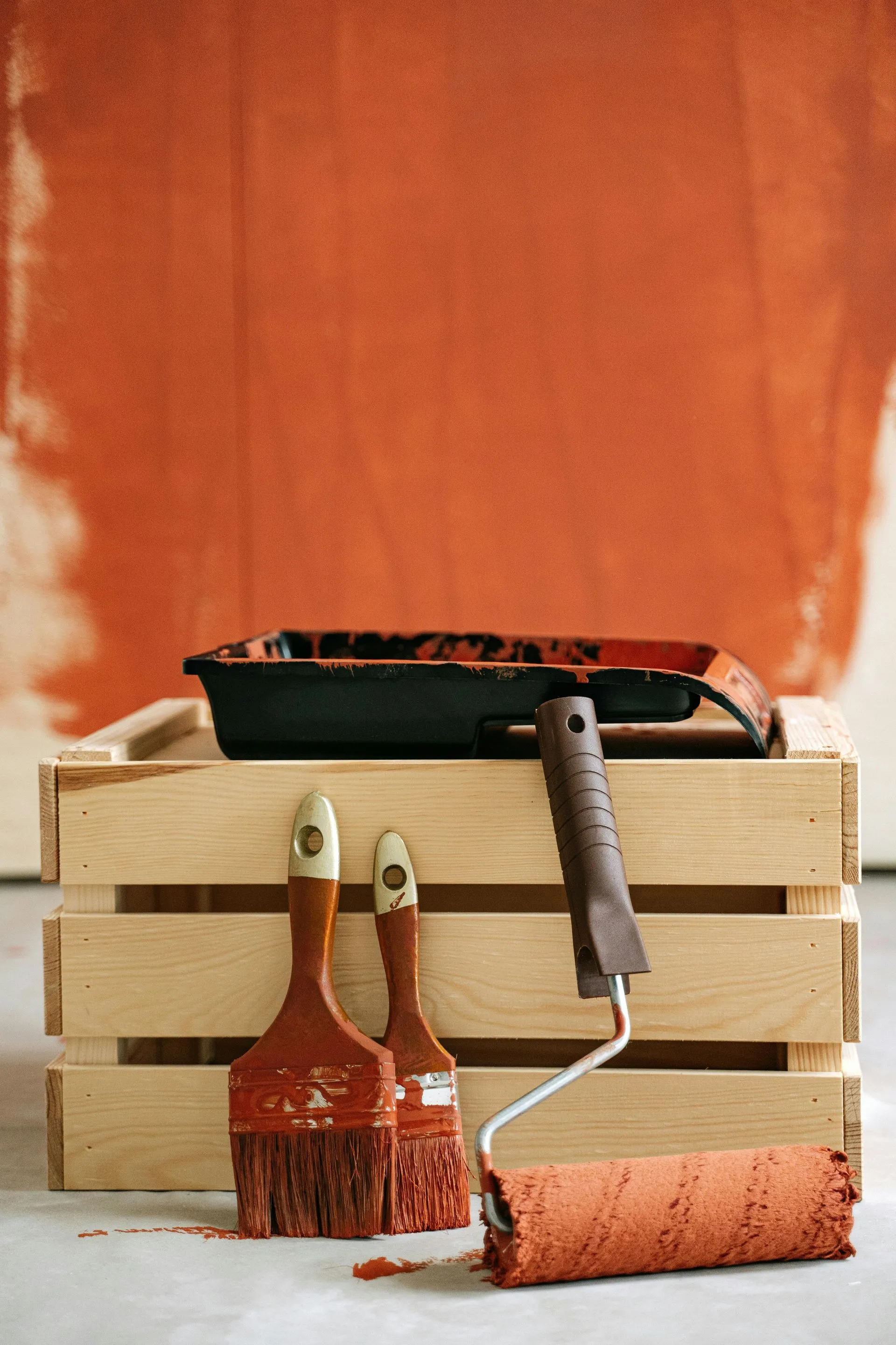 Paint rollers and brushes ready for interior finishing work on an East Hampton, NY home renovation.